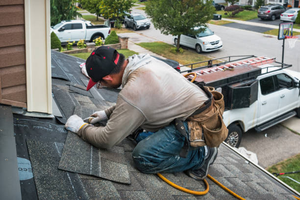 Professional Roofing technician working in Bedrock, CO